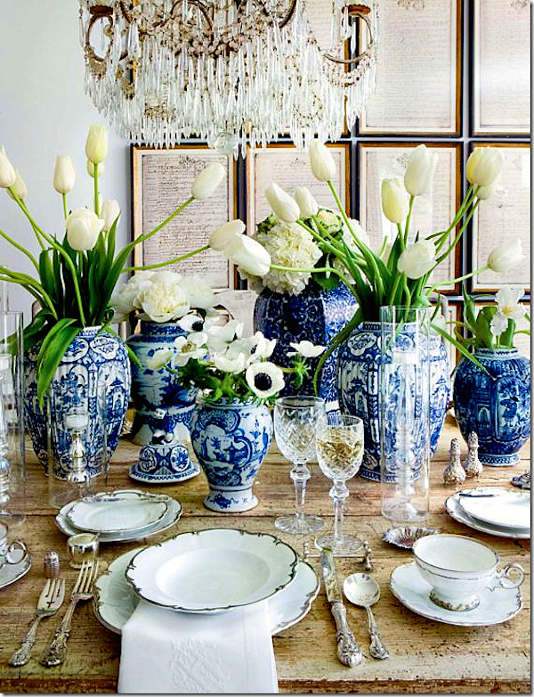 blue-white-ginger-jars-framed-prints-wall-decor-gilded-chandelier-dining-room-decorating-ideas-veranda
