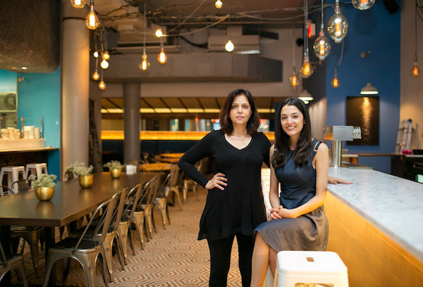 Anita Jaisinghani, the owner of Pondicheri, with her daughter Ajna Jai. Credit Nicole Craine for The New York Times